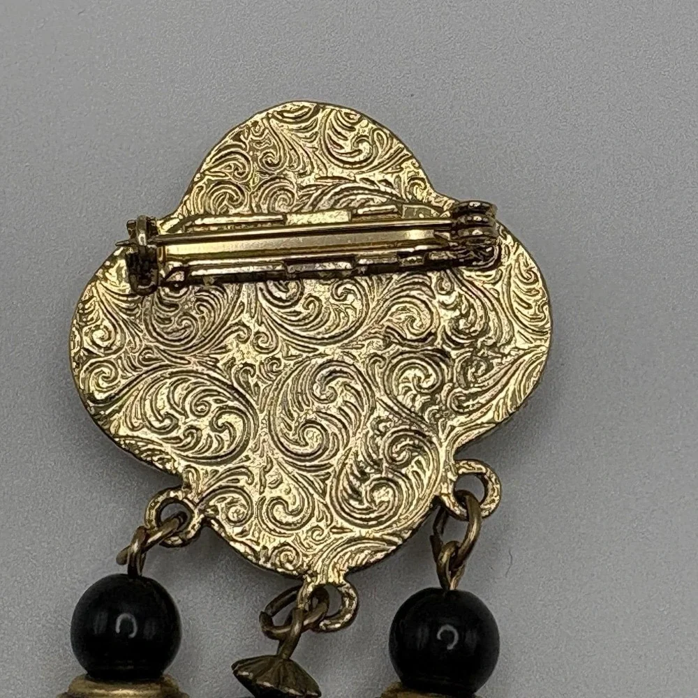 Vintage 1928 Brooch Etruscan Revival Shield Dangle Tassel Gold Black